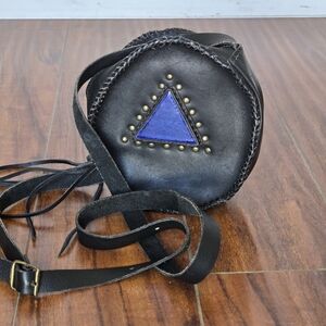 Black Leather Round Crossbody Bag with Blue Triangle Accent